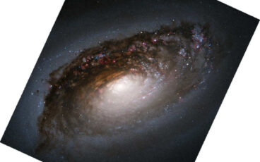Iconic HST Heritage Image of M64, showing a spiral galaxy with a dark dust lane that some say resembles a black eye.