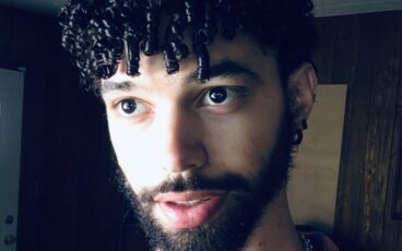 Picture of person with beard and curly hair